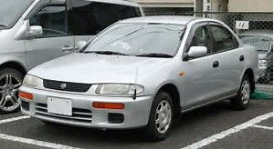 MAZDA   323  4D   BH      Φτερά