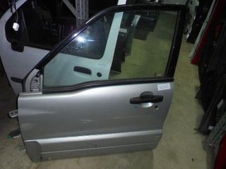 Πόρτα Εμπρός Αριστερή για SUZUKI GRAND VITARA (1999 - 2001) (SQ) SUV- ΕΚΤΟΣ ΔΡΟΜΟΥ- 5dr , (2002 - 2005) (SQ) | Kiparissis - The King Of Parts