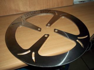 ΔΙΣΚΟΠΛΑΚΑ ΕΜΠΡΟΣ 300ΜΜ.BR.MODENAS DYNAMIK125/KRISS/KRISTAR/XCITE/GT135/ZX130/KAZEAR