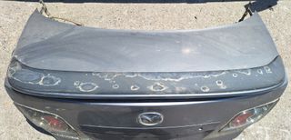 Mazda 6 Πορτ μπαγκαζ με φαναρια/Πορτα οδηγου/Διακοπτες παραθύρων/Τιμονι/Κονσόλα με Χειριστήρια/Ποτηροθηκες/Κονσολα λεβιε ταχυτήτων/Φλασιερα με σερπατινα-thumb-1