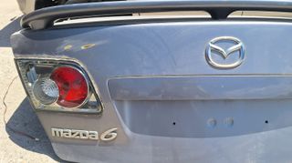 Mazda 6 Πορτ μπαγκαζ με φαναρια/Πορτα οδηγου/Διακοπτες παραθύρων/Τιμονι/Κονσόλα με Χειριστήρια/Ποτηροθηκες/Κονσολα λεβιε ταχυτήτων/Φλασιερα με σερπατινα-thumb-2