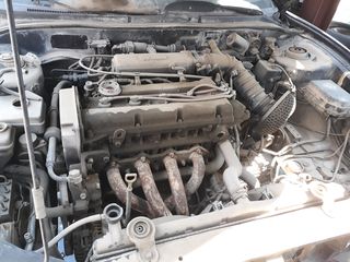 Hyundai Coupe G4GF 2000cc Μηχανη/Σασμαν/Πισω κάθισμα/Τιμόνι/Πορτα οδηγου/Ταπετσαρίες/Πισω προφυλακτηρας/Πισω φαναρια/Καθρεφτες/Κονσολα