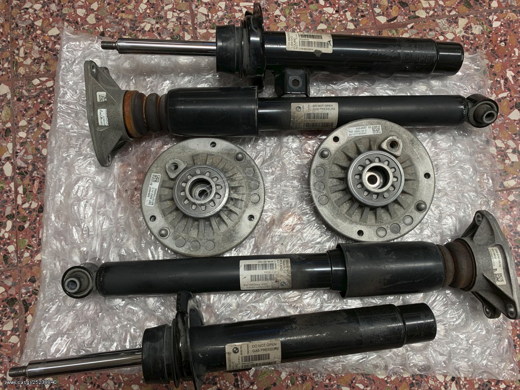 Σετ αμορτισερ (4) BMW F20 γνησια μαζι με top mounts (4)