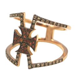 Δαχτυλίδι σε ροζ χρυσό Κ18 με τον Σταυρό της  Μάλτας με φυσικά διαμάντια βάρους 0,20ct χρώματος J καθαρότητας SI και φυσικά ζιρκόνια σε κόκκινο χρώμα Νο.56 και βάρος 4.20 γραμμάρια
Θα φροντίσ