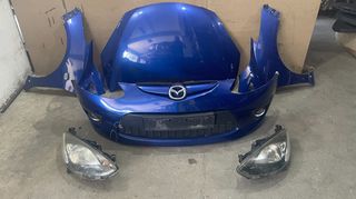 Μουράκι κομπλέ Mazda 2 2008 - 2014 facelift, με σετ αερόσακους. Έχει σπάσιμο στη μεσαία σίτα και μικρό κόψιμο προφυλακτήρα