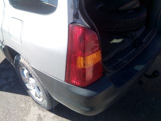 Mazda tribute  ford maverick-thumb-1
