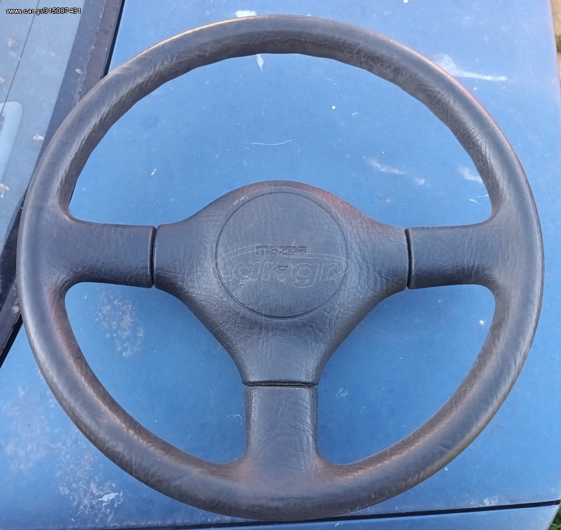 MAZDA 323  ΤΙΜΟΝΙ ΜΠΑΜΠΟΥΡΗΣ