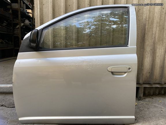 Toyota Yaris 1.300cc '99-'05 (2NZ-FE) Πόρτα εμπρός οδηγού (ασημί)