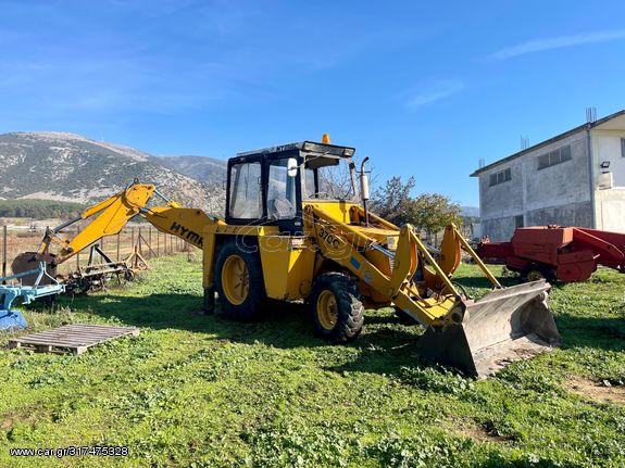 Builder loader with tires '80 Hymac 370c