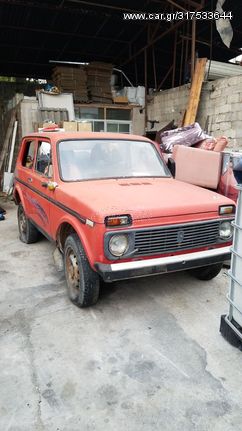 ΠΟΡΤΑΚΙ ΡΕΖΕΡΒΟΥΑΡ LADA NIVA 1.6CC 4X4