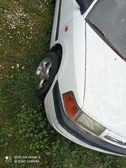 Φτερο εμπρός δεξιό Mazda 323 sedan 92-94