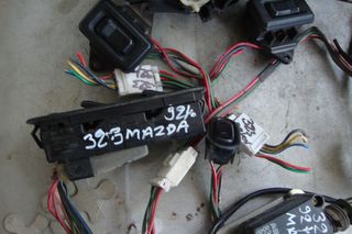 MAZDA 323 1990-95 Ανταλλακτικα & Αξεσουάρ  Αυτοκινήτων  Αμάξωμα Εσωτερικό  Μοτέρ κλειδαριάς  L / R  / Διακόπτες ΑΛΛΑΡΜ
