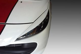 Φρυδάκια φαναριών πλαστικά Peugeot 207