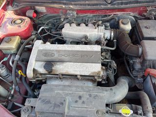 Φλοτερ Kia Shuma 2001 