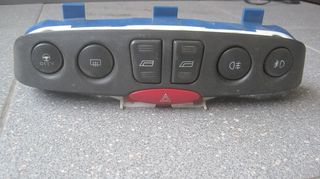 Κεντρική κονσόλα με διακόπτες ηλ.παραθύρων, αλάρμ, και προβολάκια από Fiat Punto 1999 - 2005