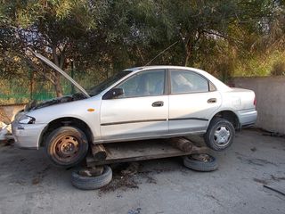 MAZDA 323 IXE