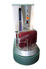 Μηχάνημα περιτυλίξεως αποσκευών με κερματοδέκτη