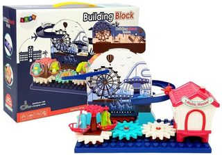 A set of blocks with a car slide, cogwheels on batteries