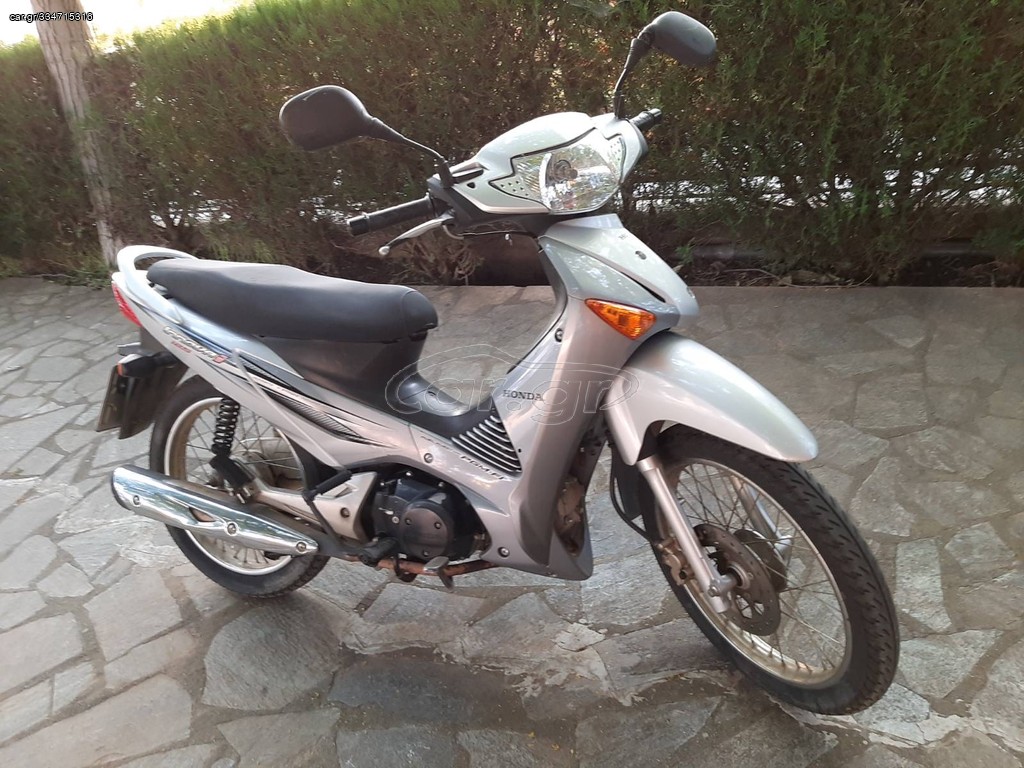 Car gr Honda Innova 125 09