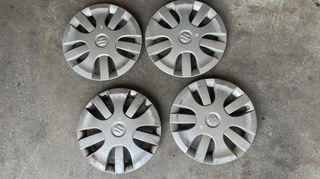 4 τάσια ζάντας 15", γνήσια μεταχειρισμένα, από Suzuki Splash