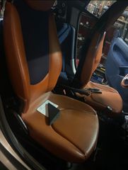 Δερμάτινο σαλόνι με τιμόνι μαζί με airbags+λεβιές ταχυτήτων 