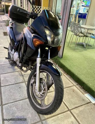 Parabrisas Givi D215S Ahumado Para Honda XL125V Varadero 2001-2006 – Montaje Original