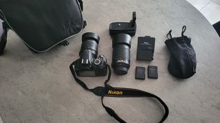 Nikon D3100 + AF-S 18-55mm VR 55-200mm DX + τσάντα Nikon + 2 μπαταριες + grip