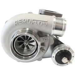 BOOSTED B5455 T3 .83 Internal Wastegate Turbocharger 660HP, Natural Cast Finish T3 Inlet Flange, Ford 5-Bolt Exhaust Flange