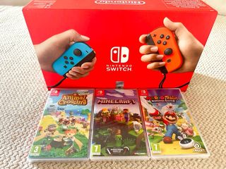 nintendo switch καινουργιο στο κουτι του με μεβρανη μαζι με 3 κλειστα παιχνιδια 