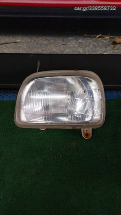 ΓΝΗΣΙΟ ΑΡΙΣΤΕΡΟ ΦΑΝΑΡΙ ΕΜΠΡΟΣ DAIHATSU CUORE ED10 L201 1990-1995 ΜΕ ΕΝΑ ΜΙΚΡΟ ΣΠΑΣΙΜΟ ΣΤΟ ΑΥΤΑΚΙ