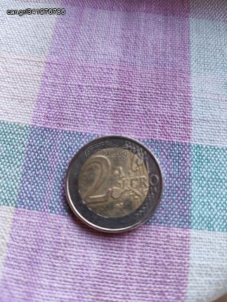 Νόμισμα 2 ευρώ του 2002 με S μέσα στο αστέρι 