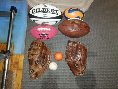 Baseball Gloves and rugby balls all one price 