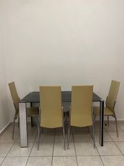 Τραπέζι Γυάλινο Χωρίς της Καρέκλες