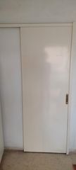 Λευκή συρόμενη πόρτα 210×74 με οδηγό