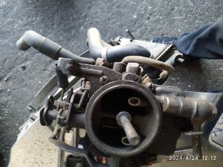 karpurater mazda 323 1400 piso 