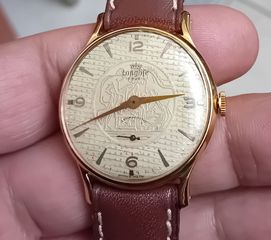 Longlife συλλεκτικό Ελβετικό ρολόι χειρός, μοναδικό με απεικόνιση αρχαίας παράστασης στο καντράν του 1940