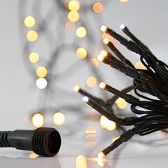 100 led λαμπάκια σε σειρά 31V με μετασχηματιστή 4 επεκτάσεις έως 3 σετ πράσινο pvc καλώδιο σε θερμό χρώμα φωτός & 9 λευκά flash led IP44