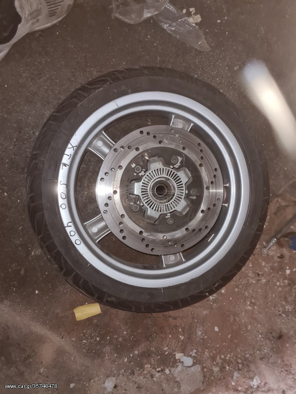 Kymco Xciting εμπρός ρόδα