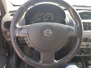 ΤΙΜΟΝΙ ΜΕ ΚΟΥΜΠΙΑ ΠΛΟΗΓΗΣΗΣ ΣΤΟ ΡΑΔΙΟ opel corsa c 2005