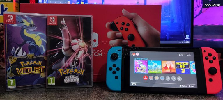 Nintendo Switch 32GB Red/Blue + 2 Pokemon Games