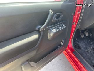 Suzuki Jimny 2010-thumb-13