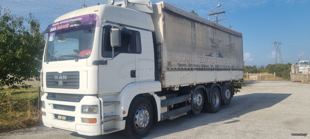 Καρότσα Μουσαμάς MAN 2001 TGA 33.410  ΚΡΕΜΑΣΤΟ ΑΞΟΝΑ ΜΠΡΟΣΤΑ ΑΠΟ ΔΙΑΓΟΡΙΚΟ