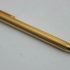 Ballpoint Pen CARTIER MUST DE CARTIER IN GOLD PLATED GODRON 14 carat