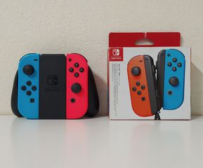 Nintendo Switch Red/Blue Joycons + Grip