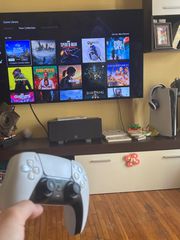 Almost new PS5 + 2 controllers, headset ,charging dock + 45 games