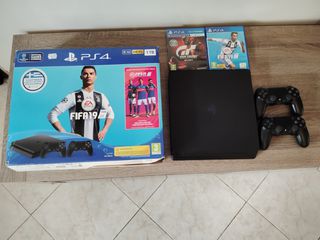 Sony PlayStation 4 slim 1 tb+ gran turismo+fifa19