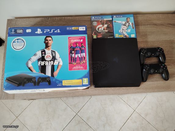 Sony PlayStation 4 slim 1 tb+ gran turismo+fifa19