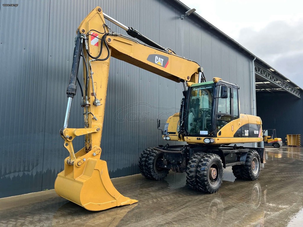 Εκσκαφέας Με Λάστιχα CAT 2007 M318D