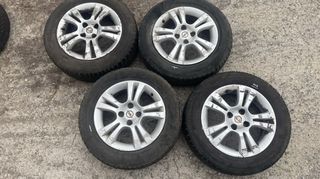 4 ζάντες γνήσιες 15"x6 (4x100) από Opel Corsa D