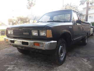 Nissan PickUp 1986 720-thumb-1
